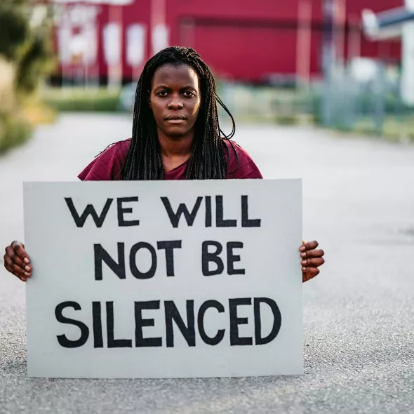 Black Female - Solo - with Sign "We Will Not Be Silenced"