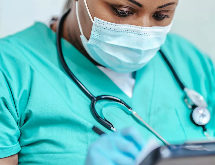 Black Female Nurse - in face mask