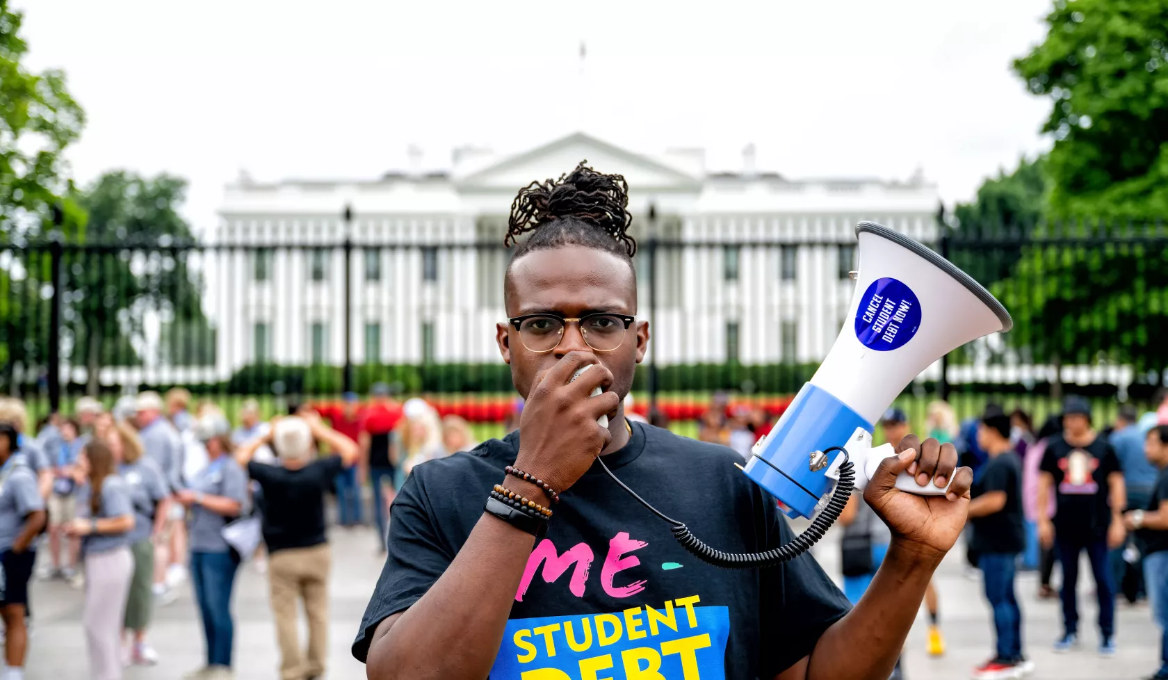 Wisdom Cole student debt protest