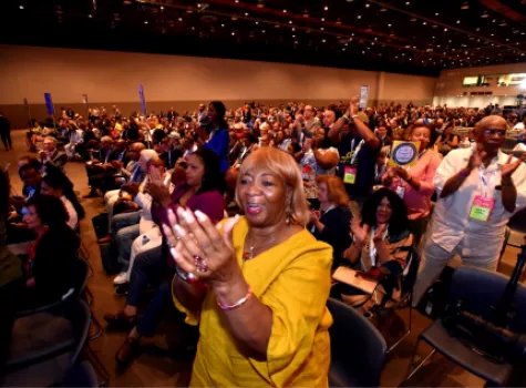 NAACP Members standing and clapping 