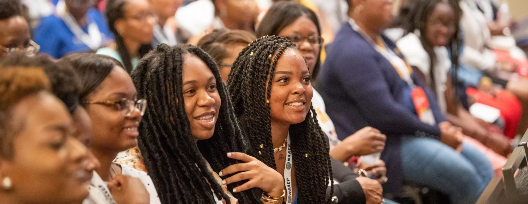 Young Black Female Students at Conference